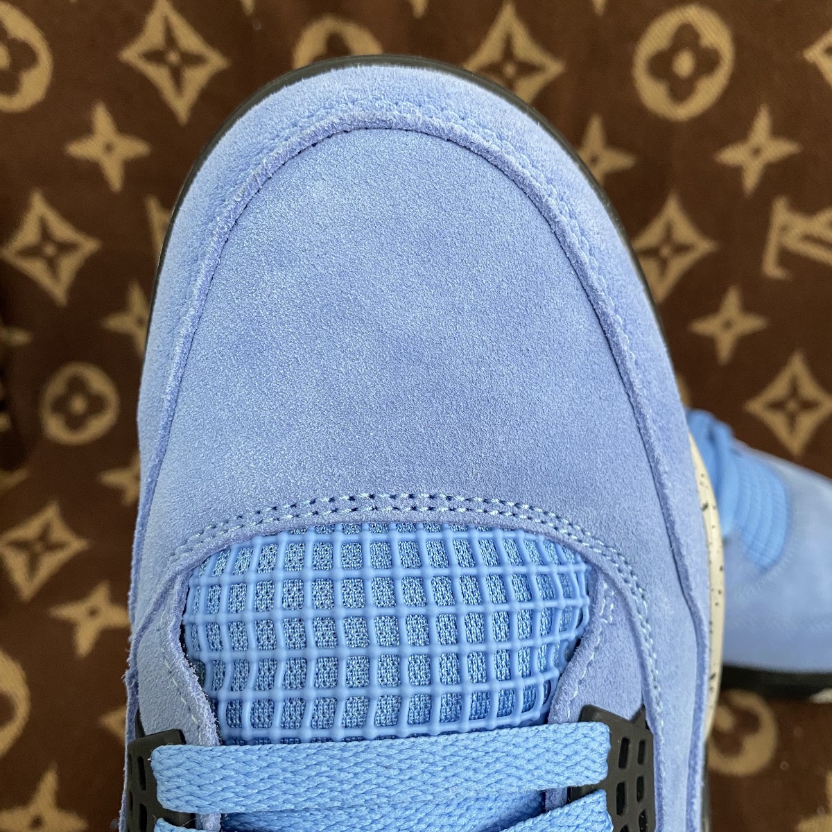 how to tell fake jordan 4 university blue